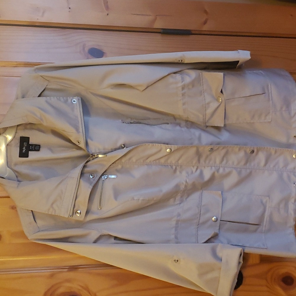 Beige utility coat.